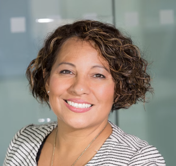 Smiling woman short curly hair